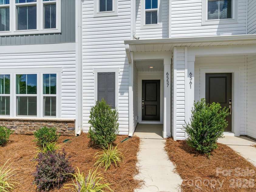 6557 Fire Lily Lane, Charlotte, NC 28216.  MLS# CAR4383907, YatesRealty ID 34325. 6557 Fire Lily Lane