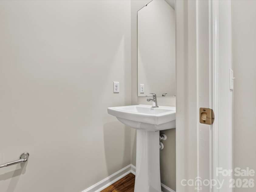 6557 Fire Lily Lane, Charlotte, NC 28216.  MLS# CAR4383907, YatesRealty ID 34325. Guest Bathroom on 2nd Floor