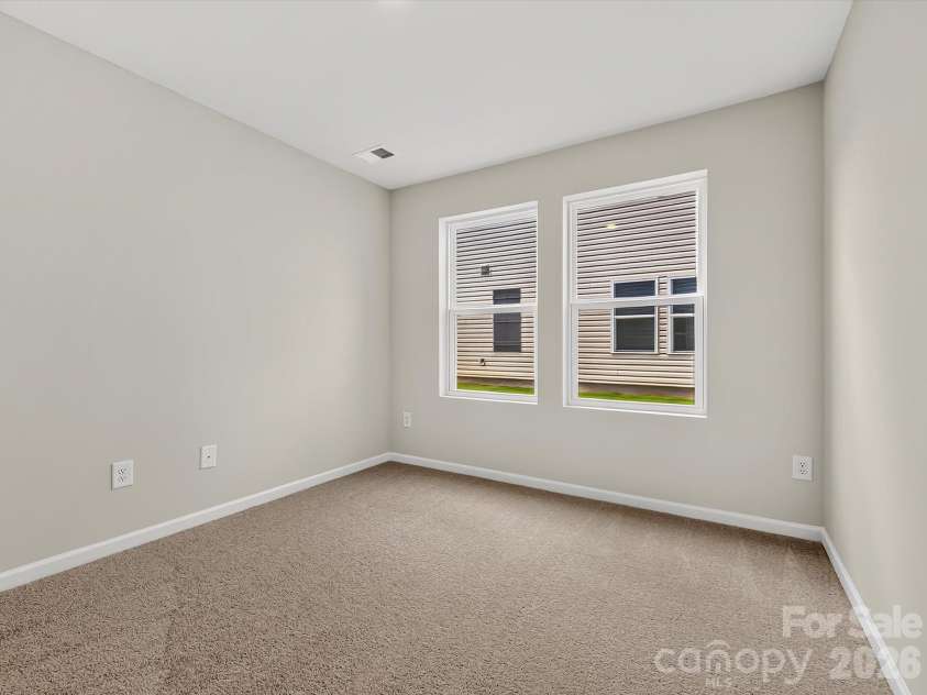 6557 Fire Lily Lane, Charlotte, NC 28216.  MLS# CAR4383907, YatesRealty ID 34325. Other Secondary Bedroom on 1st Floor