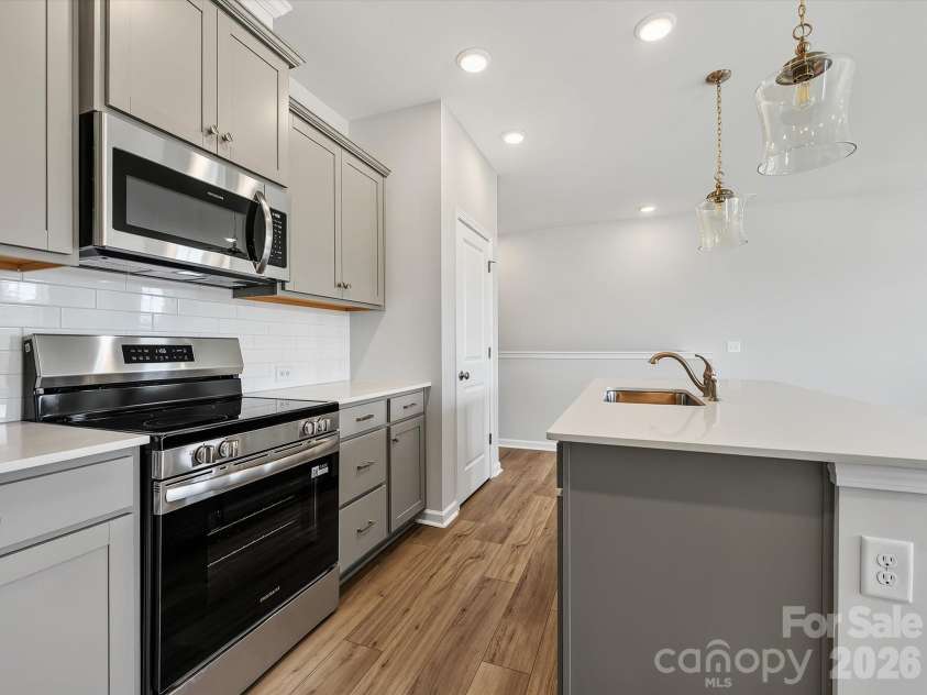 6557 Fire Lily Lane, Charlotte, NC 28216.  MLS# CAR4383907, YatesRealty ID 34325. Representative Photo of Kitchen