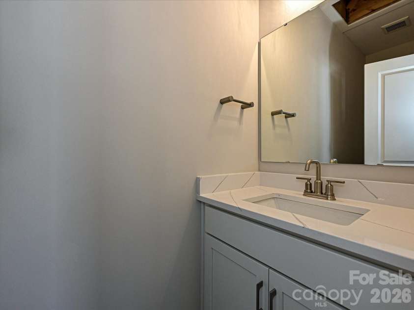 1217 34th Street, Charlotte, NC 28205.  MLS# CAR4139009, YatesRealty ID 3433. Rec Room Powder Room