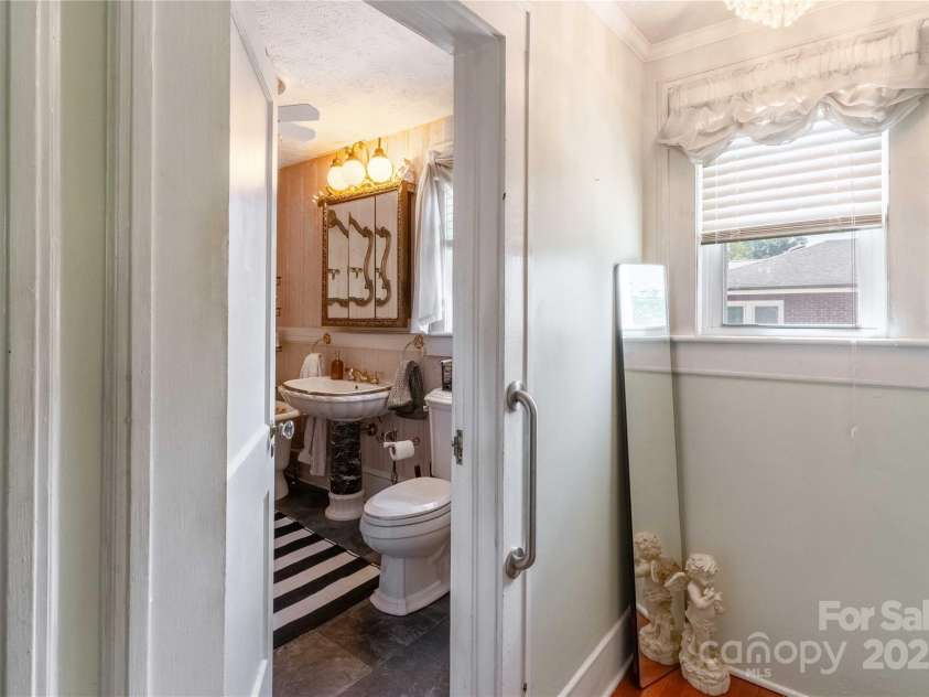 56 Brevard Road, Asheville, NC 28806.  MLS# CAR4293196, YatesRealty ID 34333. Bathroom Upstairs