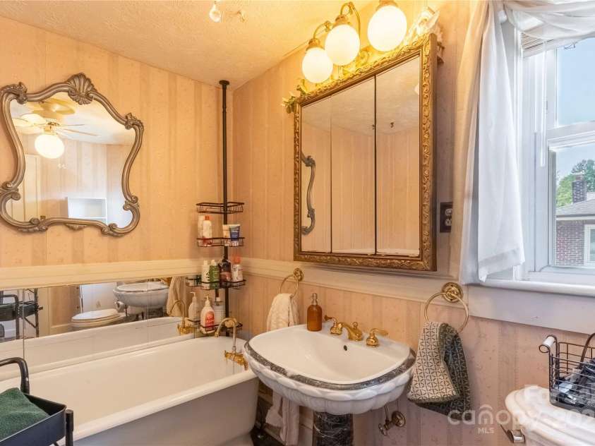 56 Brevard Road, Asheville, NC 28806.  MLS# CAR4293196, YatesRealty ID 34333. Bathroom Upstairs