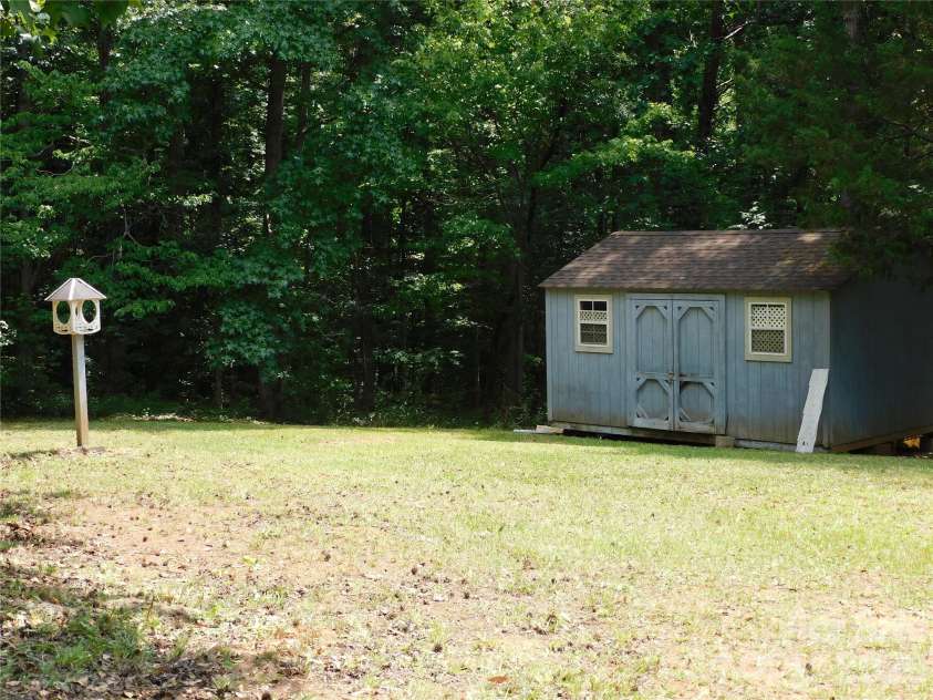 727 O Malleys Court, Clover, SC 29710.  MLS# CAR4396712, YatesRealty ID 34335. Back Yard with Shed