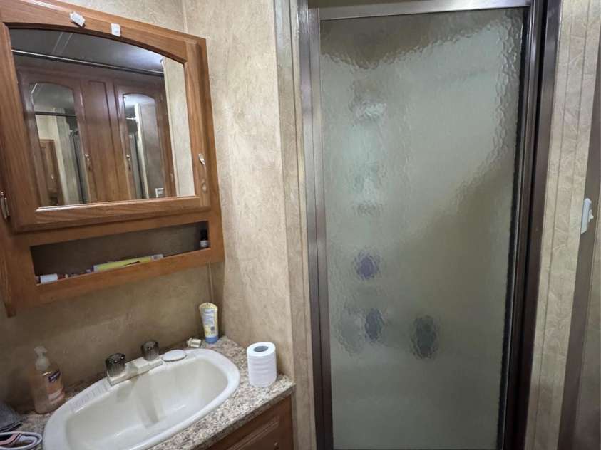 111 Club House Extension, New London, NC 28127.  MLS# CAR4295285, YatesRealty ID 34337. Glass Door Shower