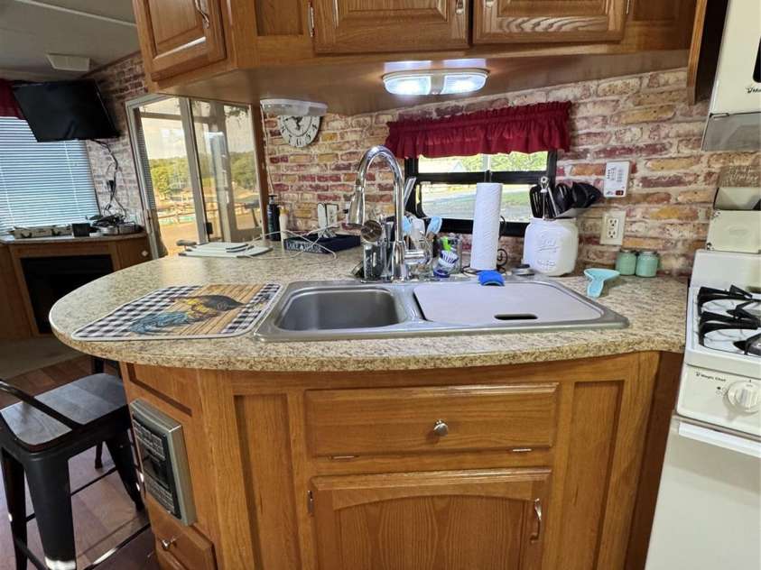 111 Club House Extension, New London, NC 28127.  MLS# CAR4295285, YatesRealty ID 34337. Kitchen Bar area