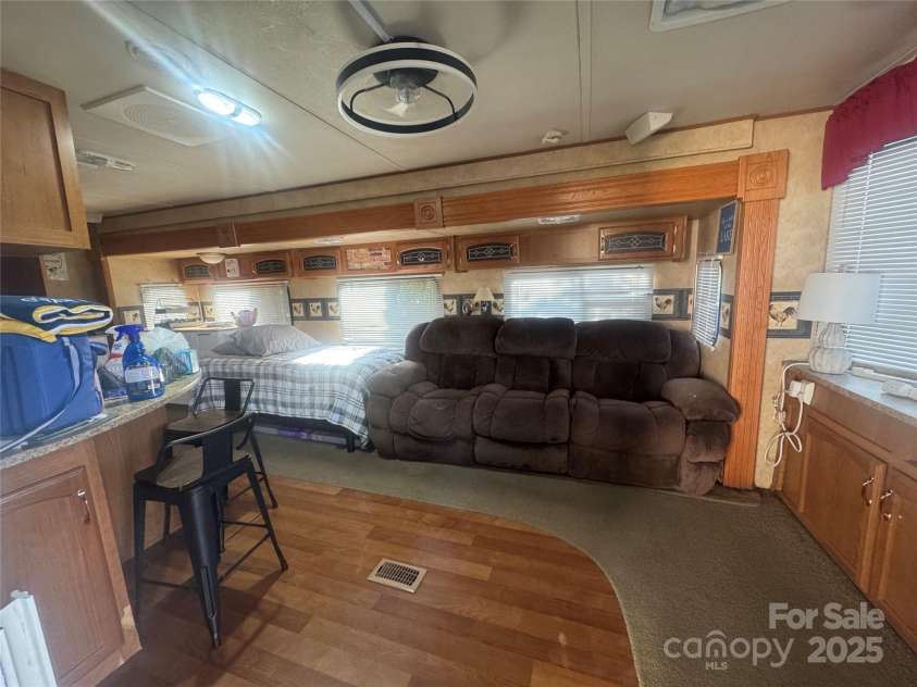 111 Club House Extension, New London, NC 28127.  MLS# CAR4295285, YatesRealty ID 34337. Open living, kitchen area