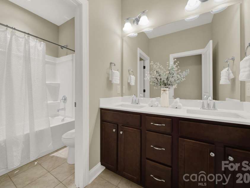 989 Emory Lane, Fort Mill, SC 29708.  MLS# CAR4356402, YatesRealty ID 34337. Hall bathroom upstairs