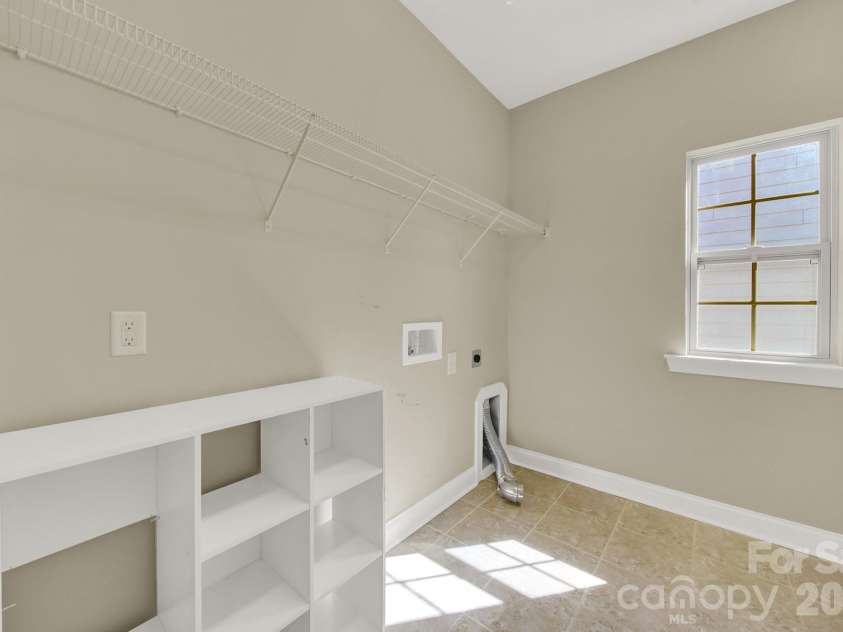 989 Emory Lane, Fort Mill, SC 29708.  MLS# CAR4356402, YatesRealty ID 34337. Laundry room