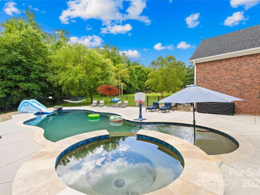 112 Berea Baptist Church Road, Stanfield, NC 28163.  MLS# CAR4173503, YatesRealty ID 3434. Enjoy the hot summer days swimming in your pool or relaxing in the hot tub.