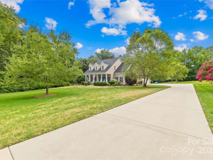 112 Berea Baptist Church Road, Stanfield, NC 28163.  MLS# CAR4173503, YatesRealty ID 3434. Look at all this parking! Perfect for bikes, skate boarding and basketball!