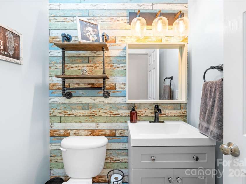 112 Berea Baptist Church Road, Stanfield, NC 28163.  MLS# CAR4173503, YatesRealty ID 3434. Powder room on the main level