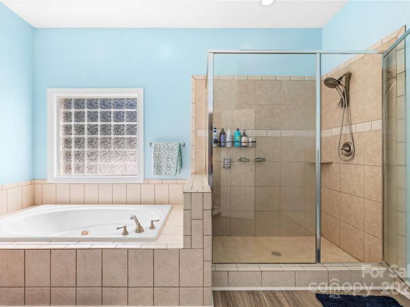 112 Berea Baptist Church Road, Stanfield, NC 28163.  MLS# CAR4173503, YatesRealty ID 3434. Primary Bath with soaking tub and walk-in shower
