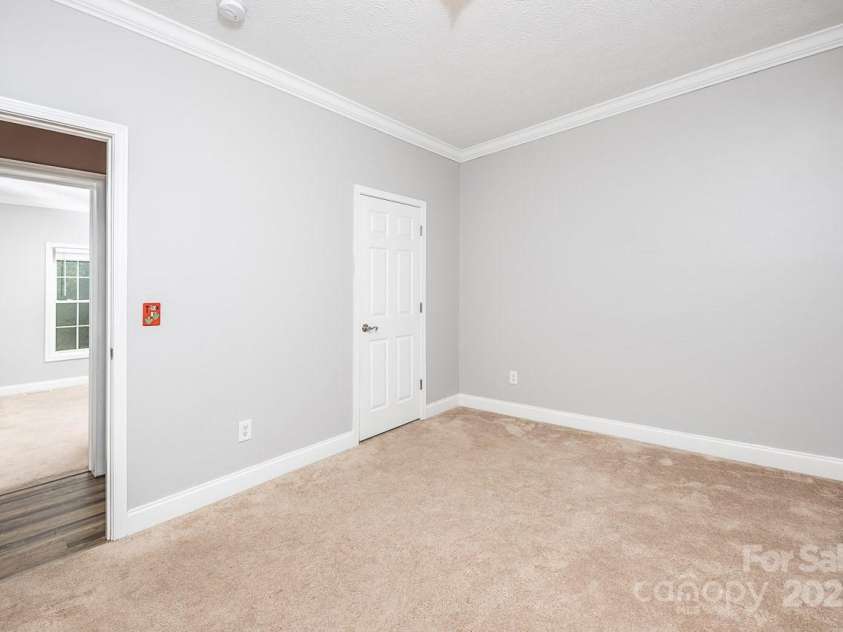 46 Badger Run, Hendersonville, NC 28739.  MLS# CAR4281037, YatesRealty ID 34340. Bedroom 2,3 down hall, split from primary suite