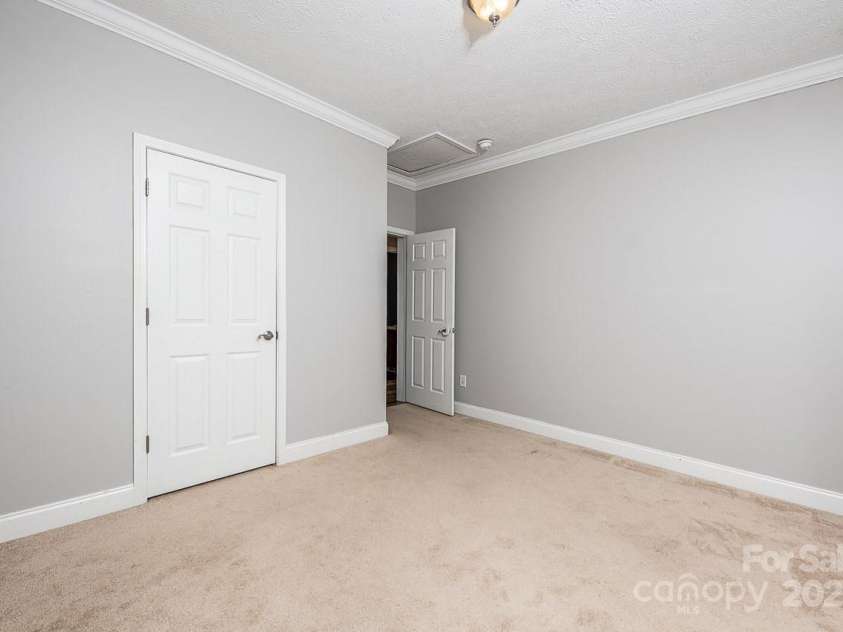 46 Badger Run, Hendersonville, NC 28739.  MLS# CAR4281037, YatesRealty ID 34340. Bedroom 3 on main level