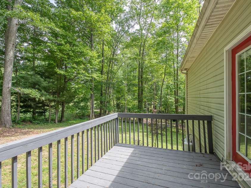 46 Badger Run, Hendersonville, NC 28739.  MLS# CAR4281037, YatesRealty ID 34340. Deck off back of kitchen