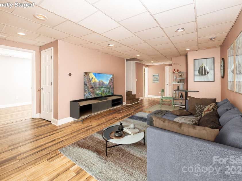 46 Badger Run, Hendersonville, NC 28739.  MLS# CAR4281037, YatesRealty ID 34340. Second living area virtually staged