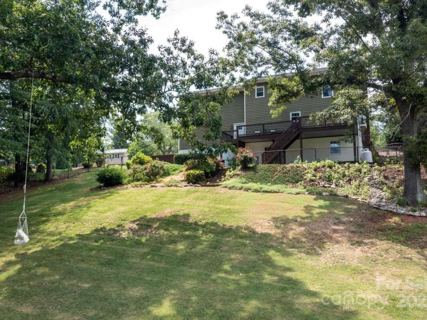 38 Tipton Drive, Candler, NC 28715.  MLS# CAR4275923, YatesRealty ID 34342. Large Fully Fenced Backyard