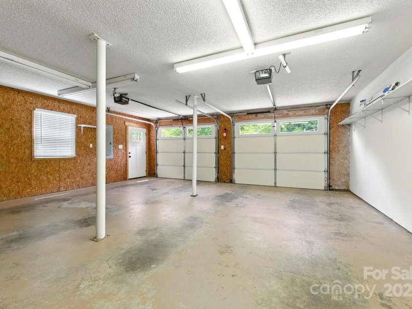 38 Tipton Drive, Candler, NC 28715.  MLS# CAR4275923, YatesRealty ID 34342. Large Two Car Garage