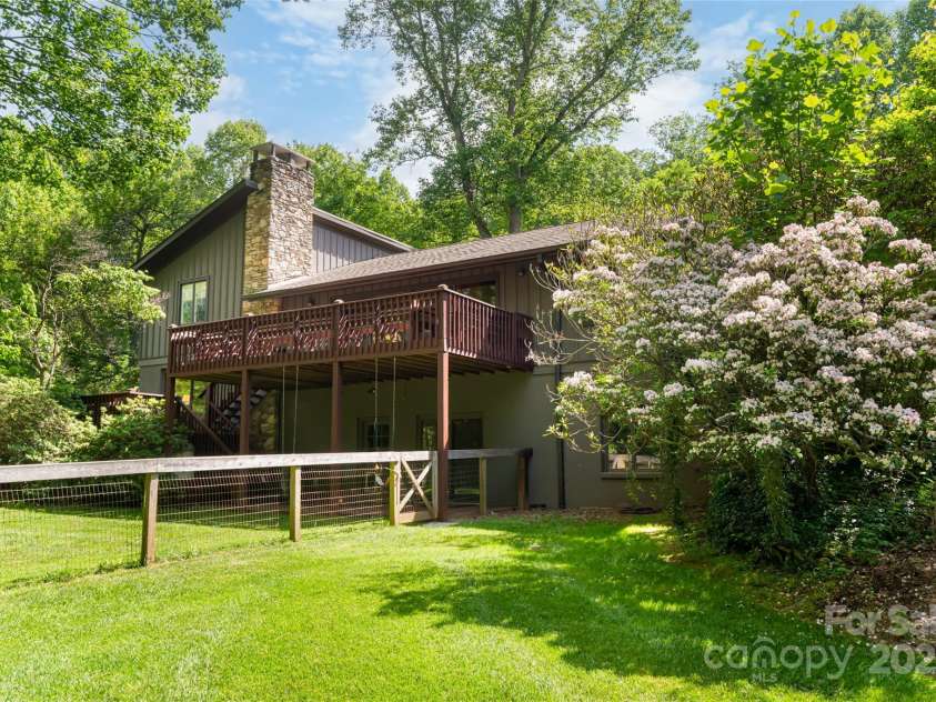 33 Deerhaven Lane, Asheville, NC 28803.  MLS# CAR4276506, YatesRealty ID 34343. Set on 2.5 acres outside of city limits yet minutes to Biltmore park