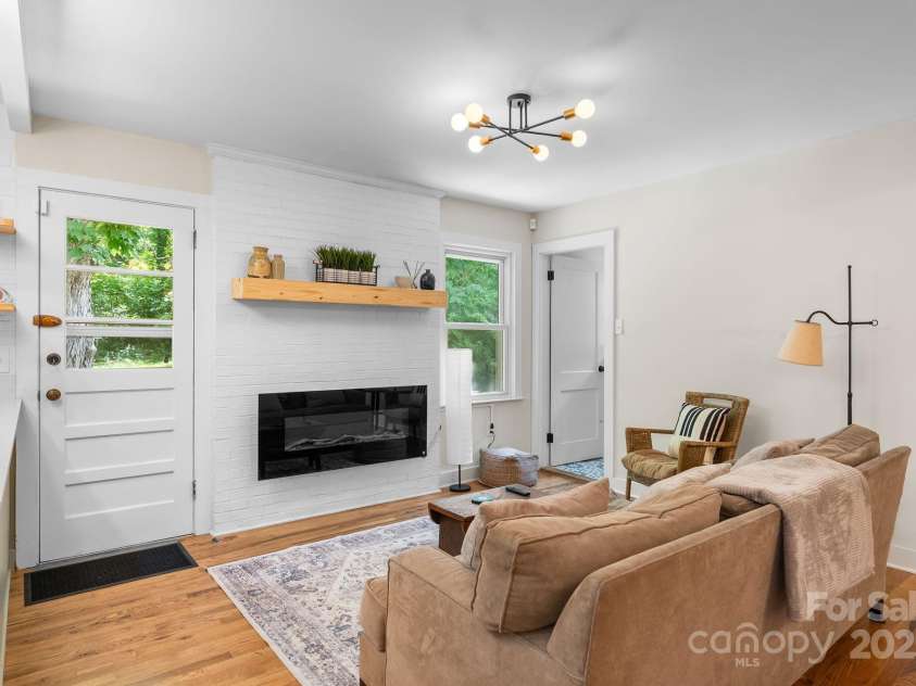 75 Craven Hill Circle, Black Mountain, NC 28711.  MLS# CAR4283464, YatesRealty ID 34347. Enjoy the fire place in the additional sitting area