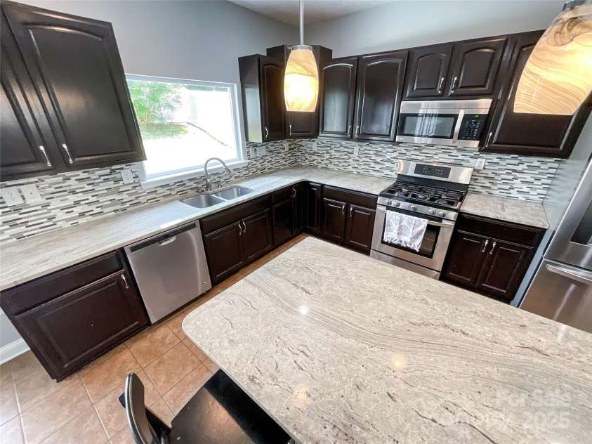 4724 Kiddle Lane, Monroe, NC 28110.  MLS# CAR4285792, YatesRealty ID 34348. 