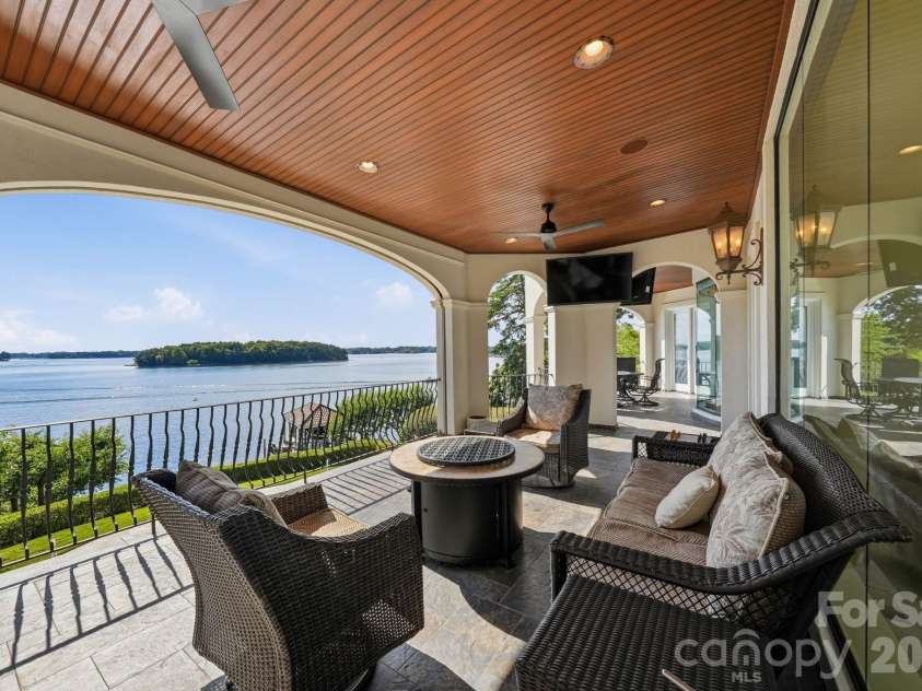 16920 Harbor Master Cove, Cornelius, NC 28031.  MLS# CAR4394741, YatesRealty ID 34351. Covered terrace accessed from the keeping room and great room.