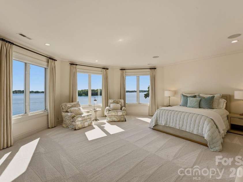 16920 Harbor Master Cove, Cornelius, NC 28031.  MLS# CAR4394741, YatesRealty ID 34351. Lake facing suite on the upper-level. 1-4