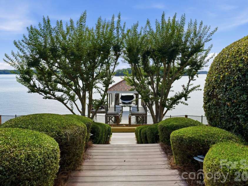 16920 Harbor Master Cove, Cornelius, NC 28031.  MLS# CAR4394741, YatesRealty ID 34351. Trex covered steps to the promenade and covered dock. 