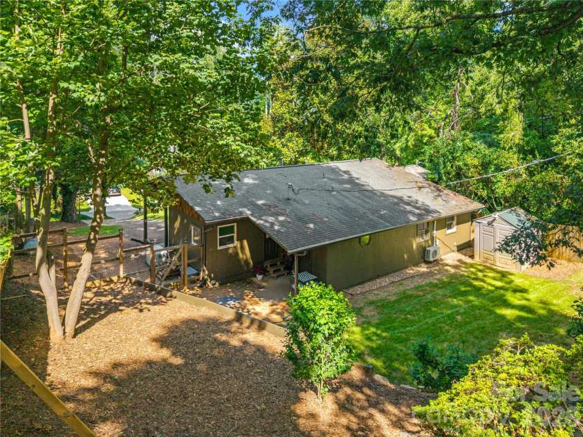 2323 Greater Druid Hills Boulevard, Hendersonville, NC 28791.  MLS# CAR4388400, YatesRealty ID 34352. Back Yard