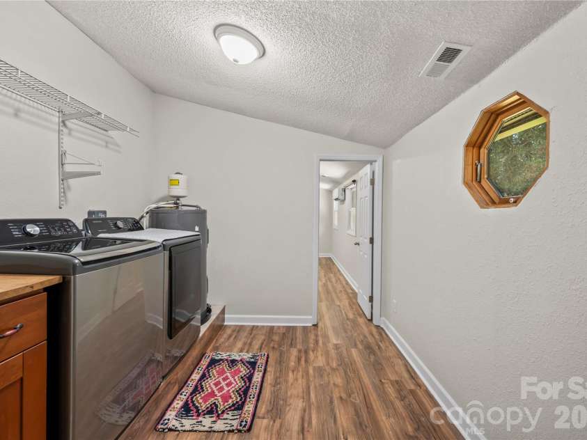 2323 Greater Druid Hills Boulevard, Hendersonville, NC 28791.  MLS# CAR4388400, YatesRealty ID 34352. Laundry Room