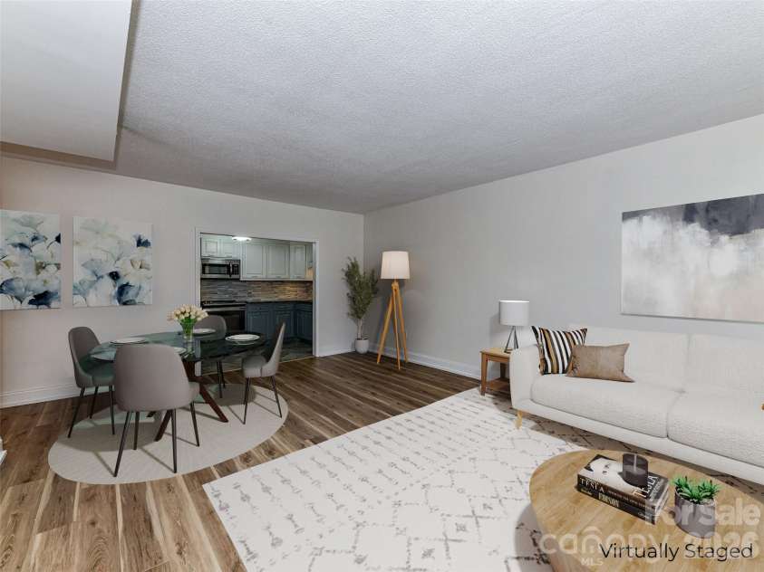 1300 Reece Road, Charlotte, NC 28209.  MLS# CAR4318620, YatesRealty ID 3436. Virtually Staged Dining Area and Family Room