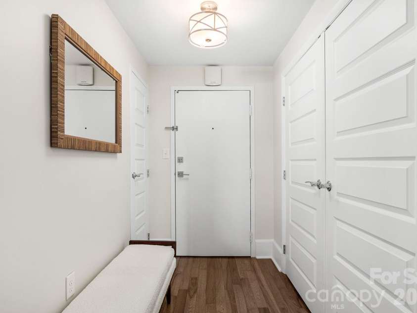 1300 Reece Road, Charlotte, NC 28209.  MLS# CAR4414970, YatesRealty ID 3436. Entry hall with large closet and gorgeous floors