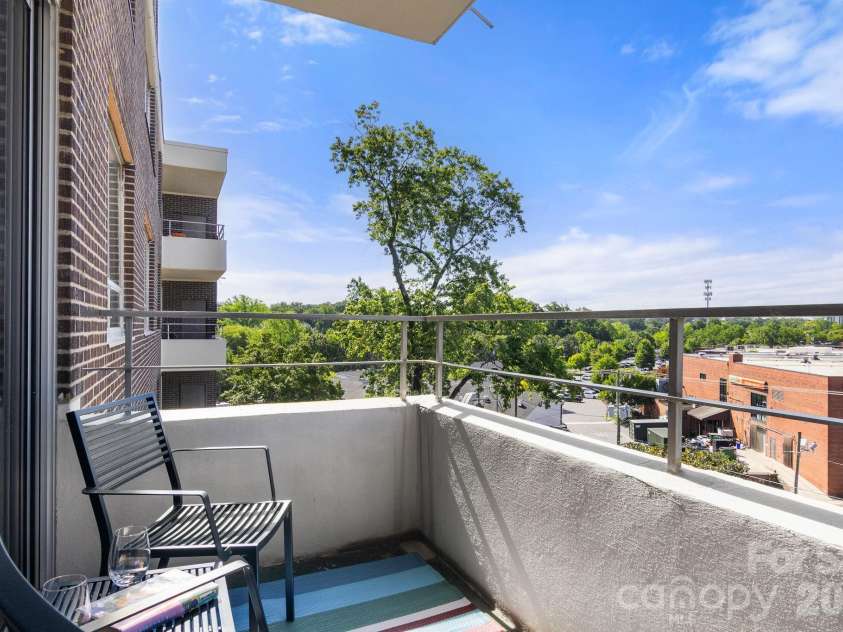 1300 Reece Road, Charlotte, NC 28209.  MLS# CAR4414970, YatesRealty ID 3436. One of two balconies