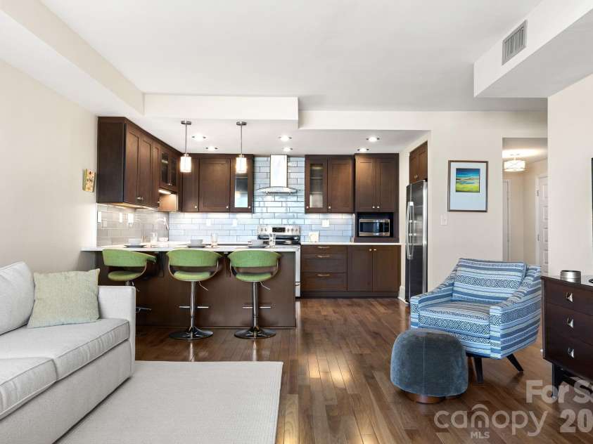 1300 Reece Road, Charlotte, NC 28209.  MLS# CAR4414970, YatesRealty ID 3436. Open Floor Plan looking into Kitchen