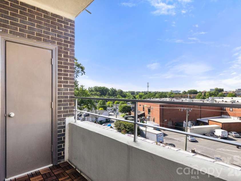 1300 Reece Road, Charlotte, NC 28209.  MLS# CAR4414970, YatesRealty ID 3436. Storage room on balcony