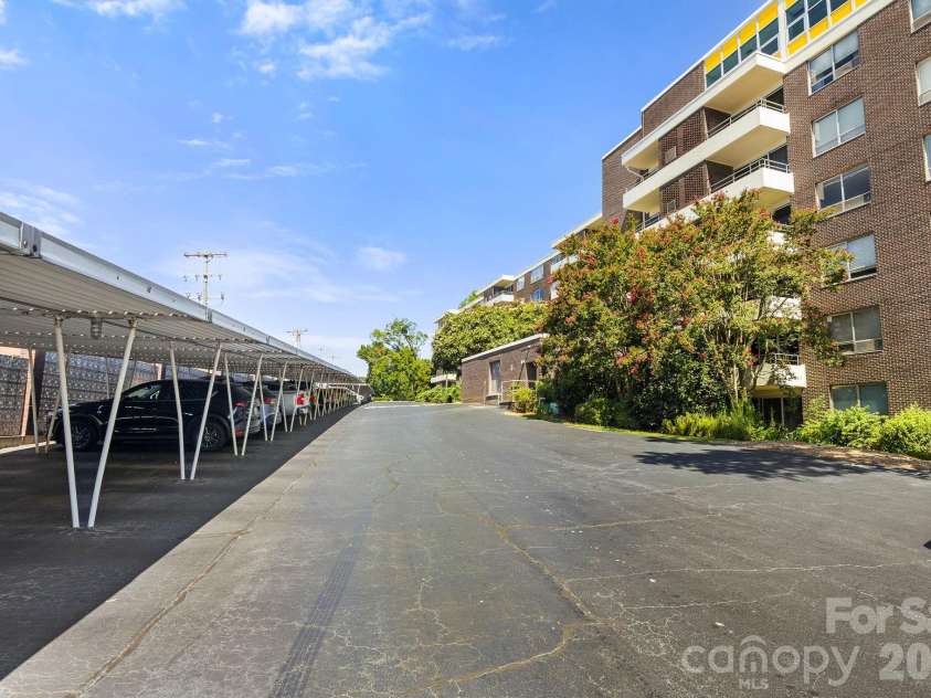 1300 Reece Road, Charlotte, NC 28209.  MLS# CAR4414970, YatesRealty ID 3436. Unit comes with one Covered Parking Spot