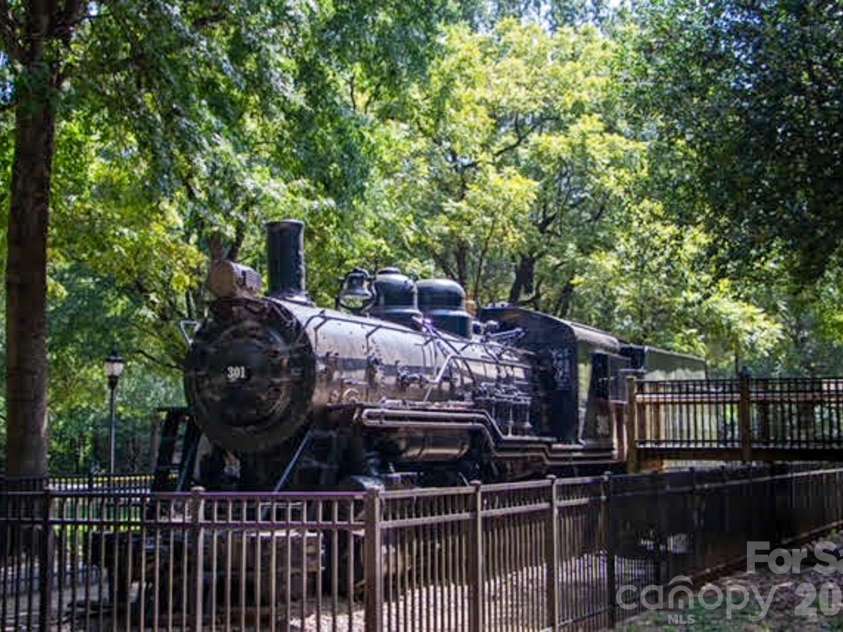 1300 Reece Road, Charlotte, NC 28209.  MLS# CAR4414970, YatesRealty ID 3436. Walk to Freedom Park from Greenway