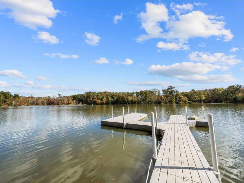25566 Seagull Drive, Lancaster, SC 29720.  MLS# CAR4391988, YatesRealty ID 34360. Floating dock with a jet ski floating slip