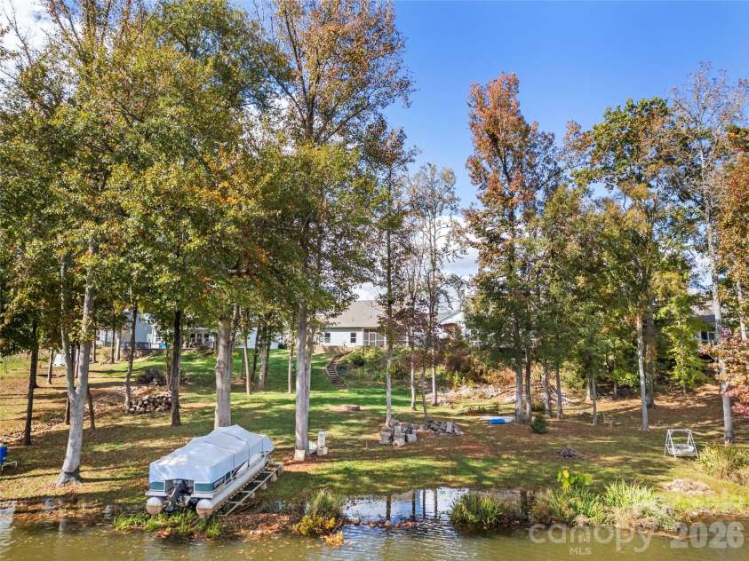 25566 Seagull Drive, Lancaster, SC 29720.  MLS# CAR4391988, YatesRealty ID 34360. On shore, boat slide 