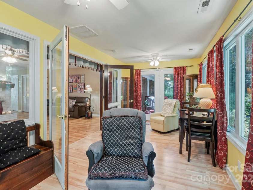 106 Laurel Lane, Etowah, NC 28729.  MLS# CAR4285948, YatesRealty ID 34361. Sunroom view toward deck side