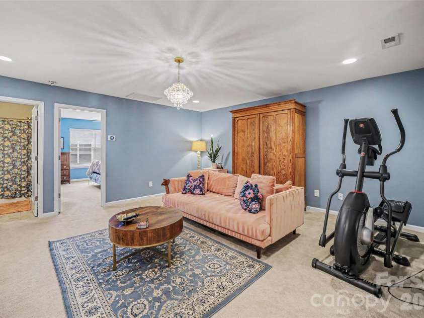 10718 Cove Point Drive, Charlotte, NC 28278.  MLS# CAR4387399, YatesRealty ID 34364. Upstairs loft landing