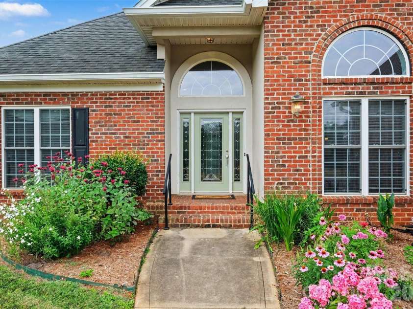 115 Blakemore Drive, Shelby, NC 28152.  MLS# CAR4393685, YatesRealty ID 34369. Beautiful landscaping and a front porch greet you.