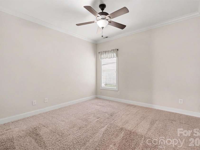 115 Blakemore Drive, Shelby, NC 28152.  MLS# CAR4393685, YatesRealty ID 34369. Beautiful molding as well as neutral paint and carpet continue into the 2nd and 3rd bedrooms! Here is the 2nd bedroom on the opposite side of the living areas.