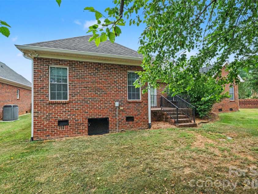 115 Blakemore Drive, Shelby, NC 28152.  MLS# CAR4393685, YatesRealty ID 34369. Crawlspace door in the back