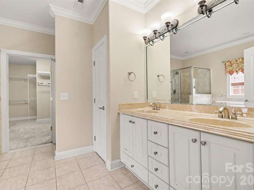 115 Blakemore Drive, Shelby, NC 28152.  MLS# CAR4393685, YatesRealty ID 34369. Highlights of the primary bath include dual vanity, linen closet, tile flooring,...
