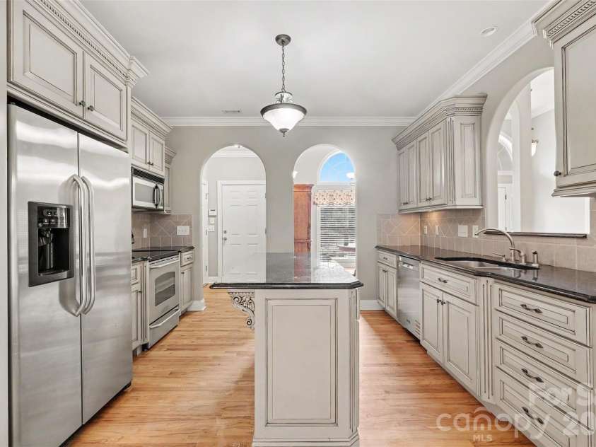 115 Blakemore Drive, Shelby, NC 28152.  MLS# CAR4393685, YatesRealty ID 34369. More features include a great layout with stainless steel appliances, tile backsplash, recessed and pendant lighting, warm hardwood floors, plus a large opening to the living room!