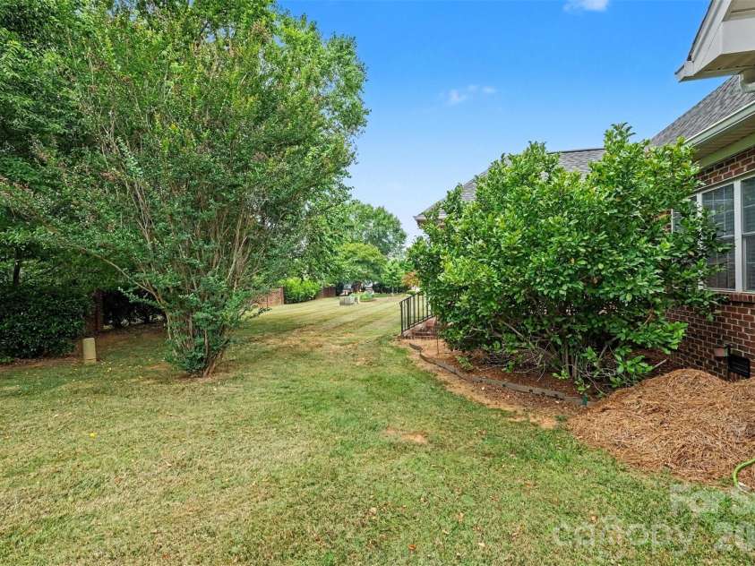 115 Blakemore Drive, Shelby, NC 28152.  MLS# CAR4393685, YatesRealty ID 34369. Opposite side view of back of home and common area