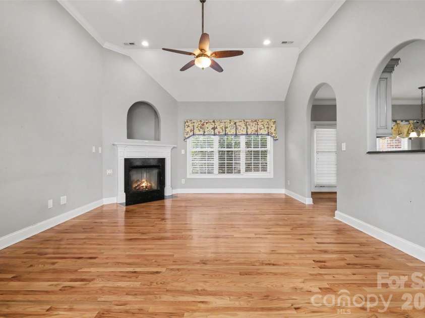 115 Blakemore Drive, Shelby, NC 28152.  MLS# CAR4393685, YatesRealty ID 34369. View from the foyer into the large living room with vaulted ceiling