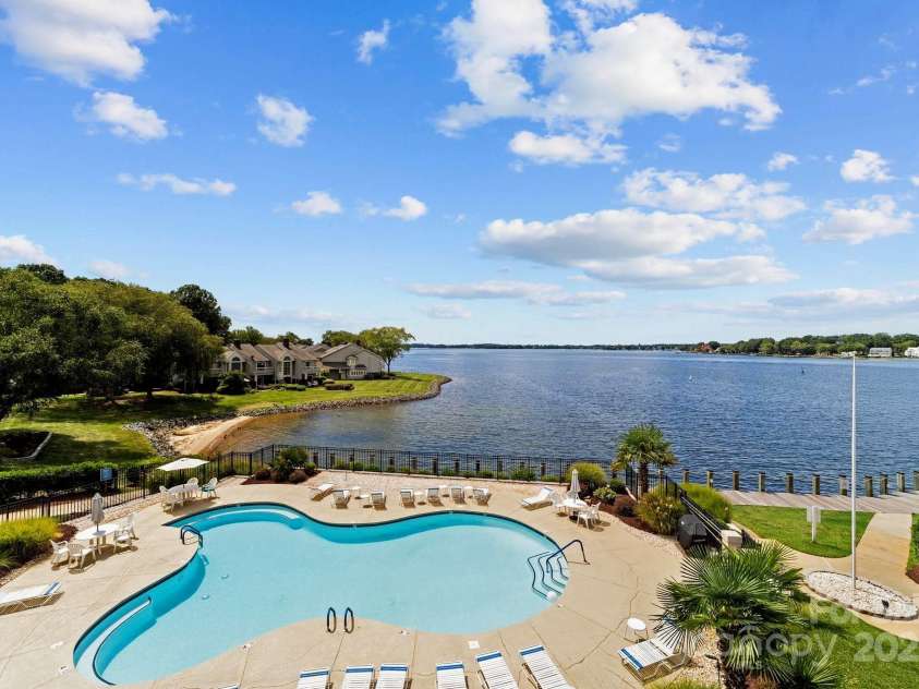 18647 Vineyard Point Lane, Cornelius, NC 28031.  MLS# CAR4294074, YatesRealty ID 34373. Community Pool with long range views of Lake Norman